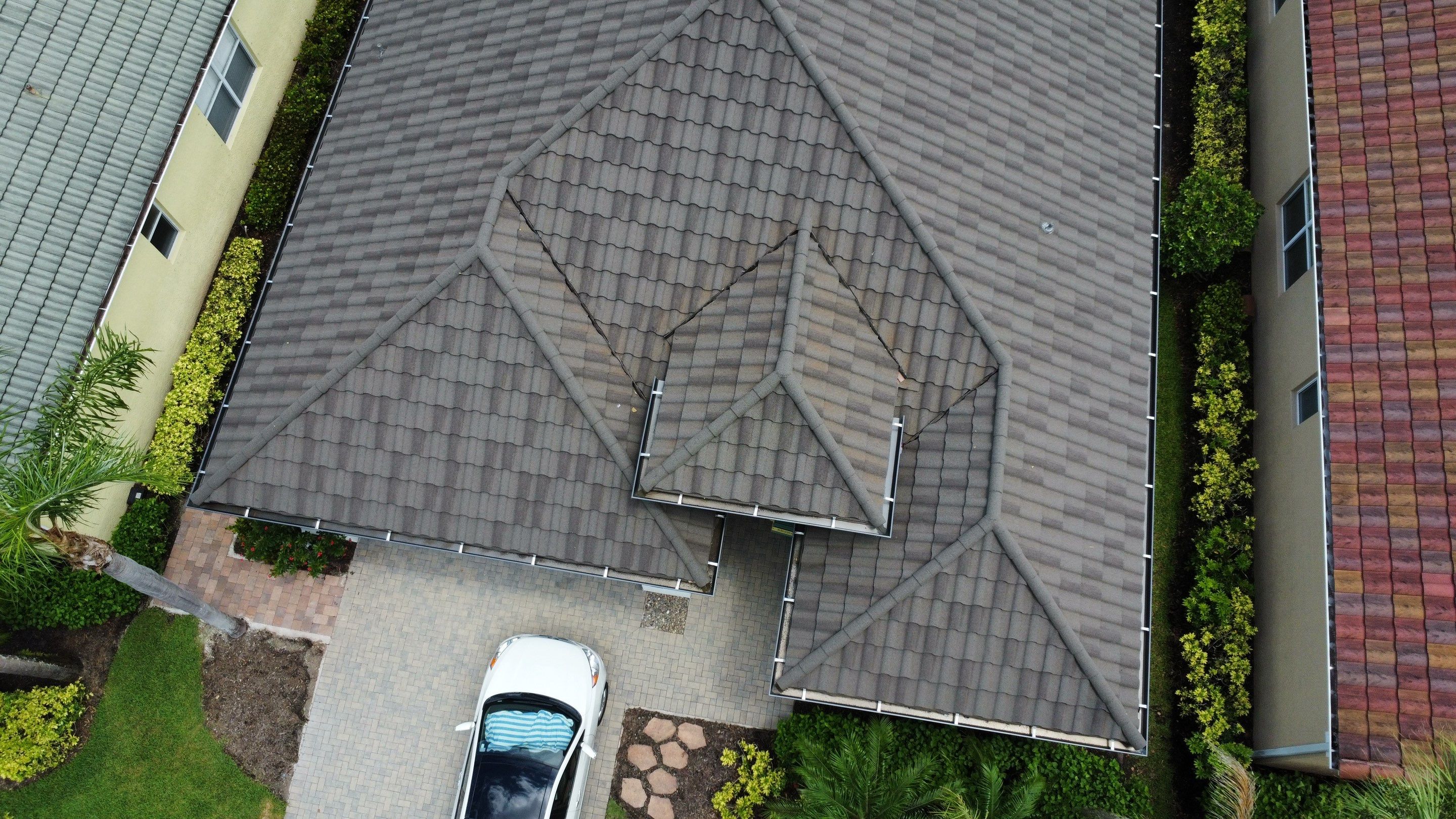 Aerial overhead view of tile roof installation