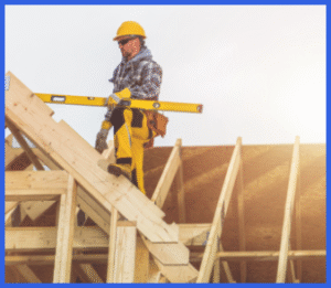 Professional construction worker using level during framing