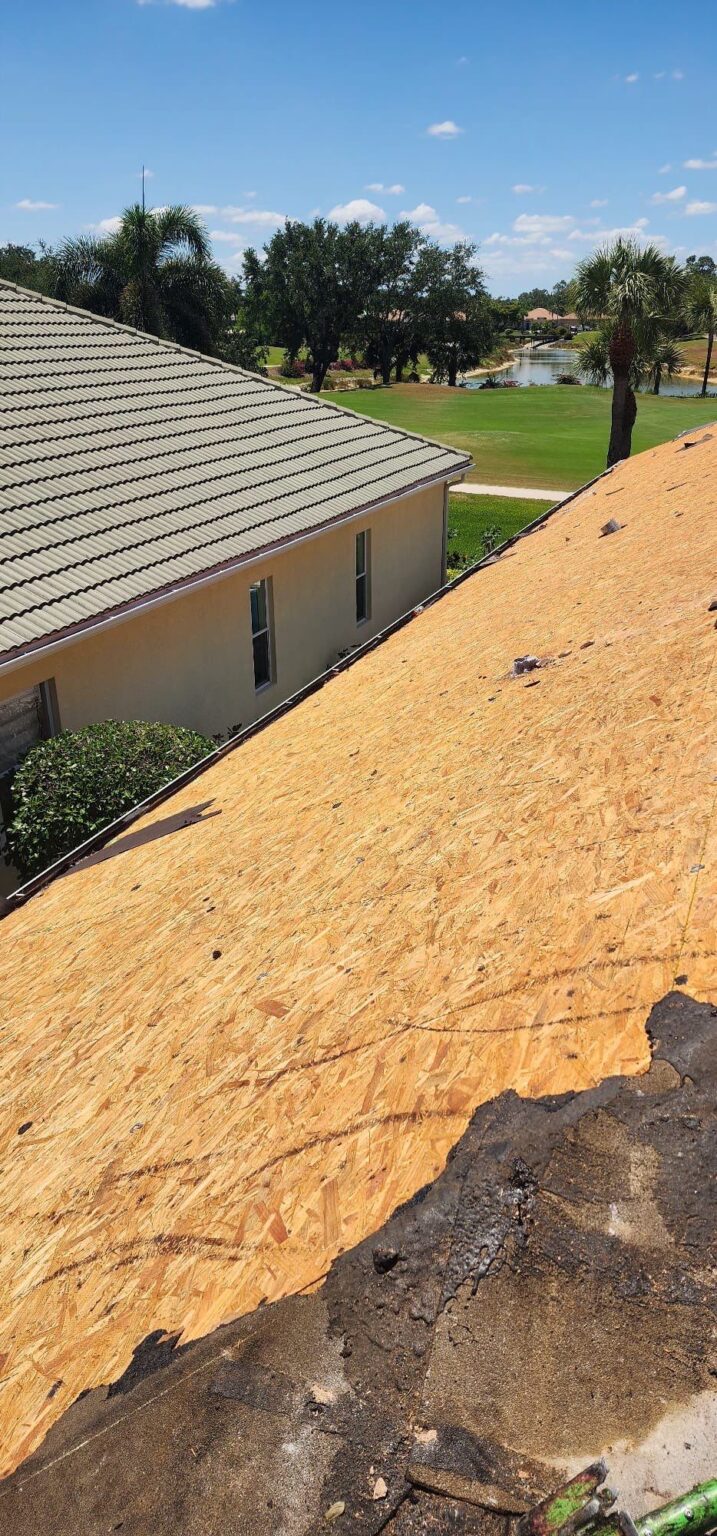 Worker team action shot during roofing installation